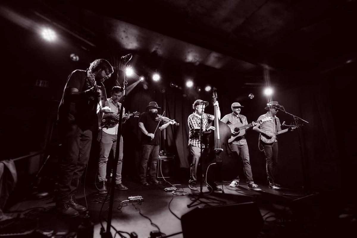 Fed on Peaches performing live on stage at Moe's. — © Jess Nelson