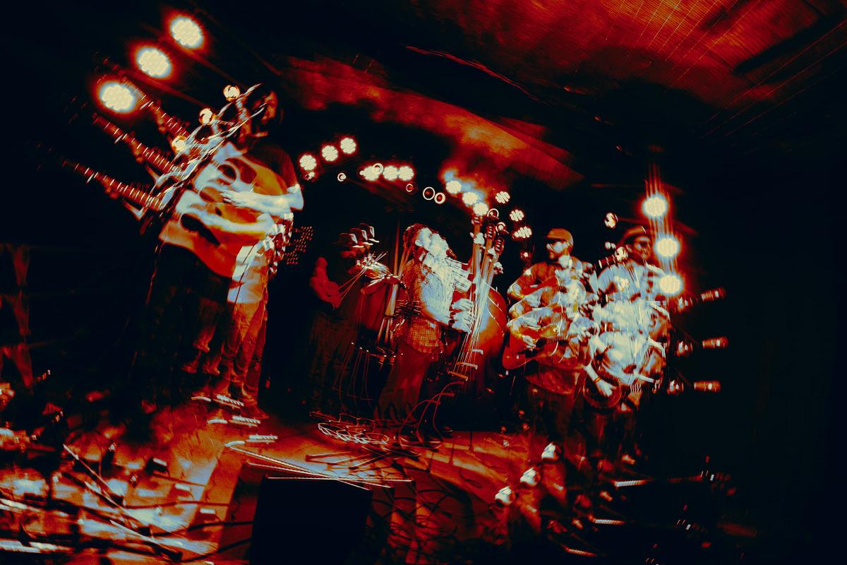Fed on Peaches performing live on stage at Moe's. — © Jess Nelson